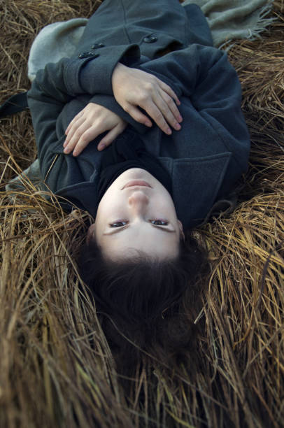 istock young woman on autumn walk 916294968