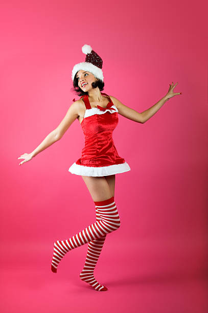 istock smiling and jumping christmas girl 91629759