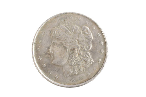 istock old vintage silver dollar isolated on background 916300962