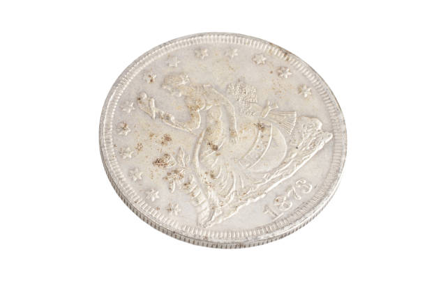 istock old vintage silver dollar isolated on background 916301086