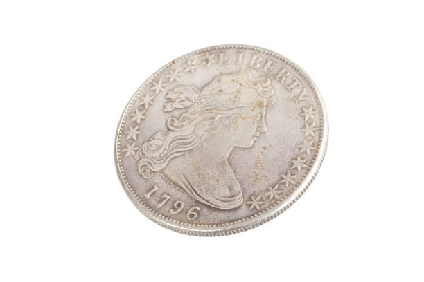 istock old vintage silver dollar isolated on background 916303354