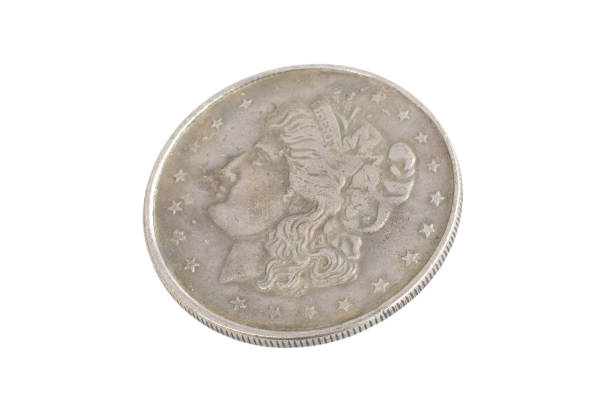 istock old vintage silver dollar isolated on background 916303364