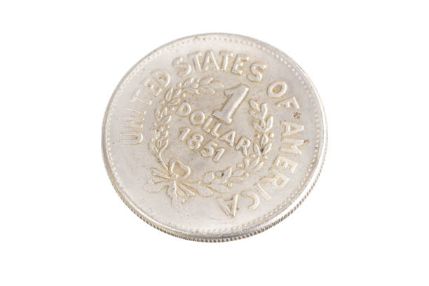 istock old vintage silver dollar isolated on background 916303430