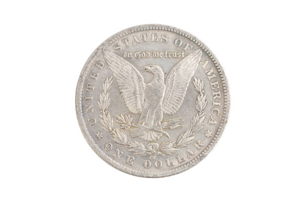 istock old vintage silver dollar isolated on background 916303494