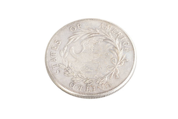 istock old vintage silver dollar isolated on background 916303822