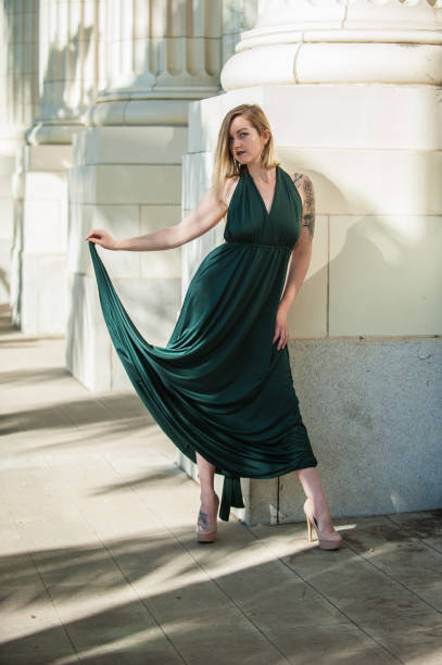 istock Curvy dress against sturdy columns. 916307520