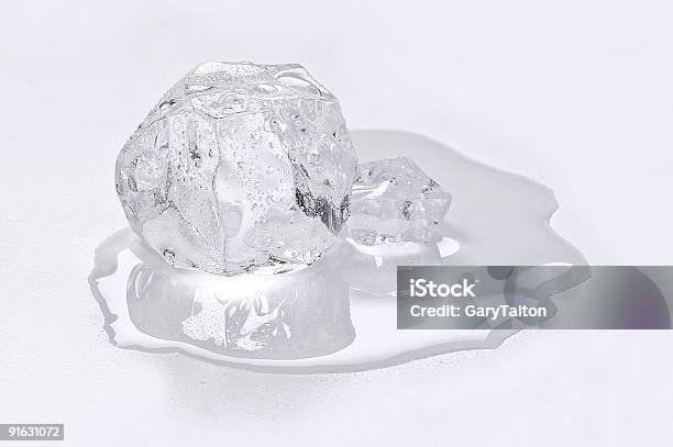 Ice Cube Melting Stock Photo - Download Image Now - Melting, Ice Cube, Puddle