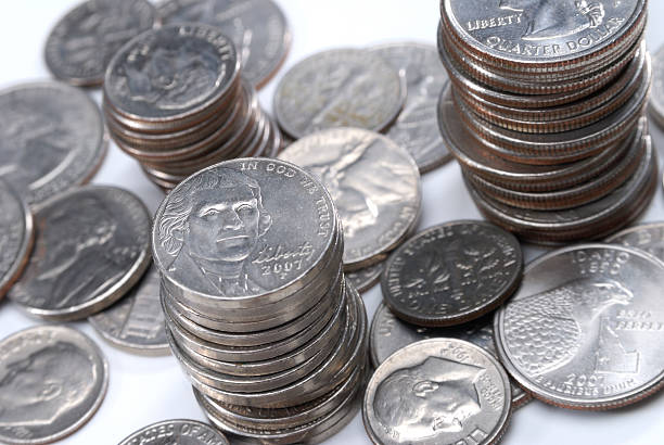 istock Stacks of coins and loose change 91631081