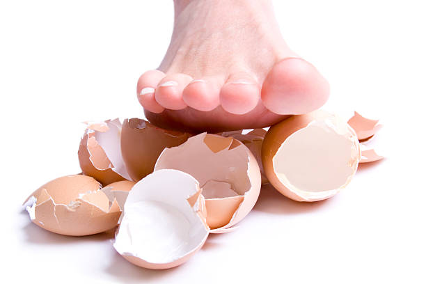 Stepped on eggshells animal egg walking on eggshells walking broken stock pictures, royalty-free photos & images