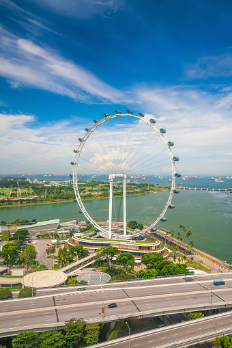 SINGAPORE - AUGUST 10: Singapore Flyer on August 10, 2017 at Marina bay in Singapore. It  was first conceived in the early 2000s by Patrick MacMahon