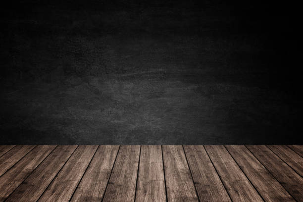istock Empty wooden floor with dark concrete wall background, For product display. 916314202