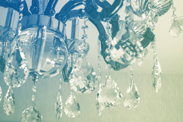 istock Crystal chandelier close-up. Glamour background with copy space 916314308