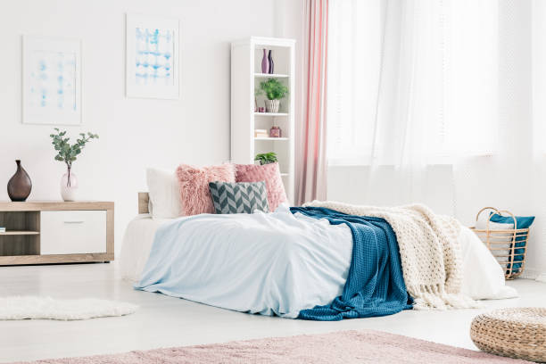 istock Pink and blue bedroom interior 916314402