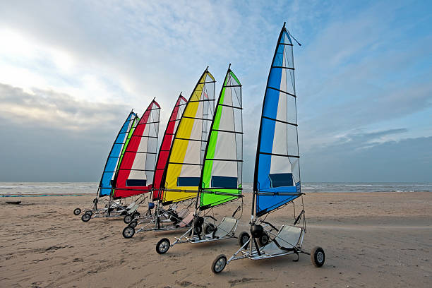 Beachsailing at the dutch coast in  Netherlands  kite sailing stock pictures, royalty-free photos & images