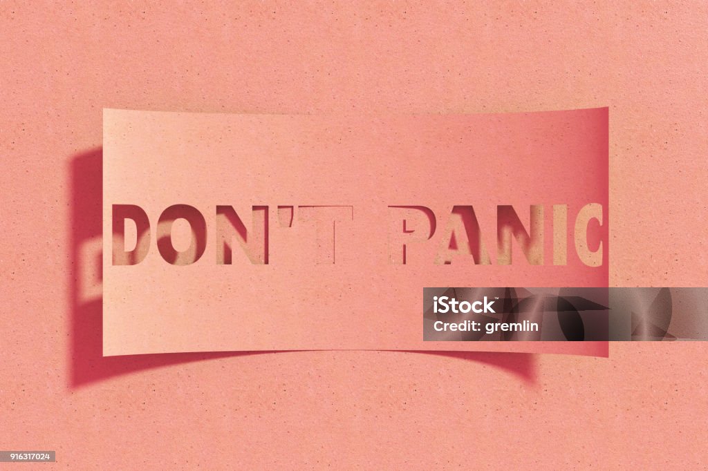 Paper note with words Dont Panic Paper note with words Dont Panic. Terrified Stock Photo