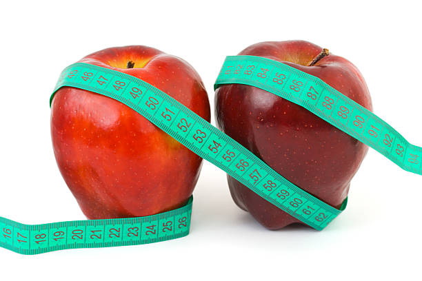 istock Apples and measuring tape 91632245