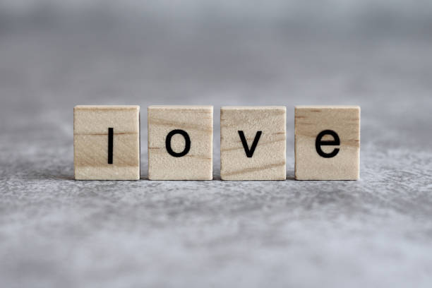 istock Love word written on wood cube 916329568