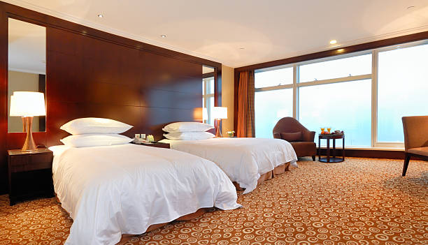 istock Posh hotel room interior in whites and browns 91633264
