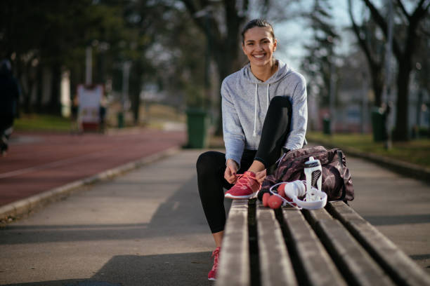 istock Beautiful young sportswoman preparing for training 916333306