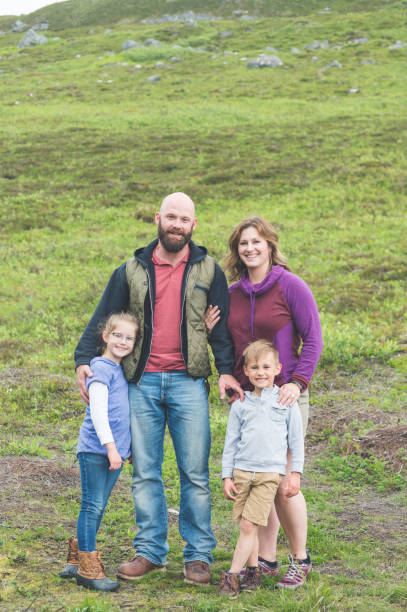 istock Family hiking on Alaska mountain 916333470