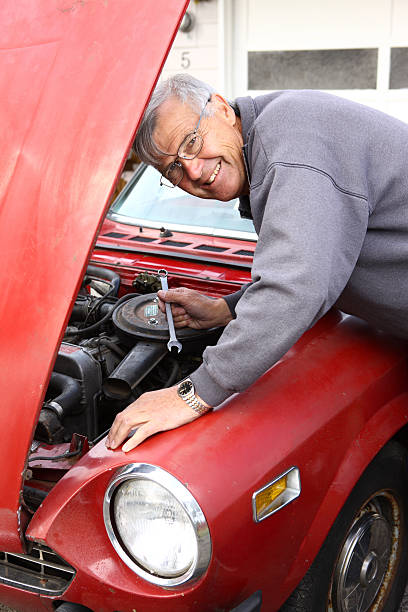 istock Senior man working on classic car 91633693