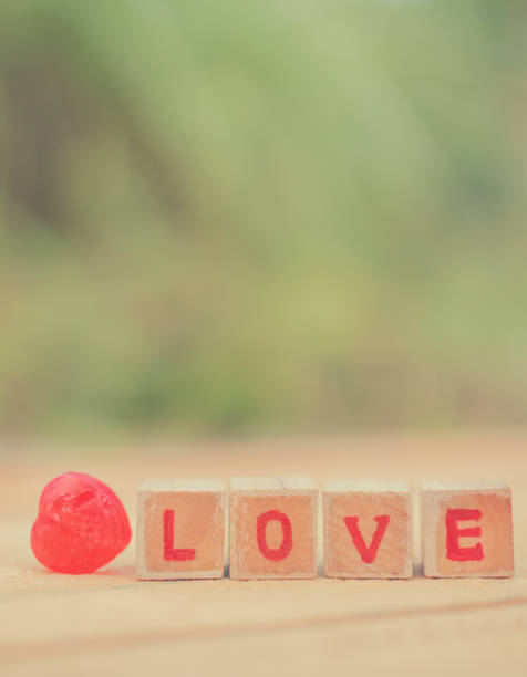 istock Love message written in wooden blocks. 916340330