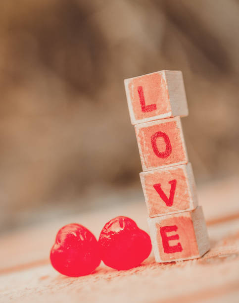 istock Love message written in wooden blocks. 916340402