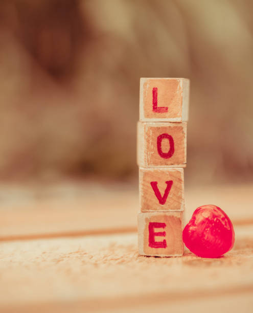 istock Love message written in wooden blocks. 916340404