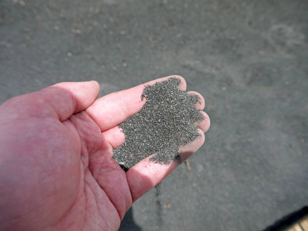 istock Volcanic ash in the hand 916351956
