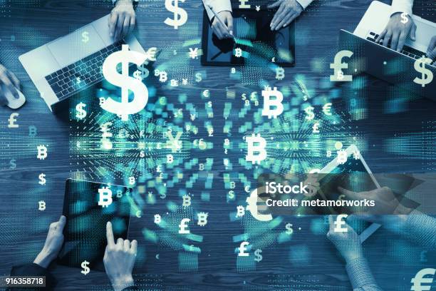 Group Of Businesspeople And Financial Technology Concept Stock Photo - Download Image Now