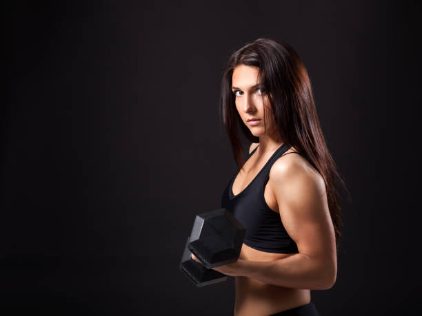 istock woman demonstrates biceps 916361522