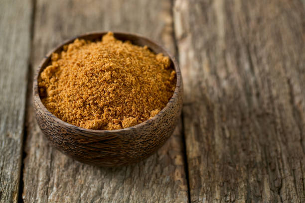 istock coconut palm sugar on wooden surface 916362044