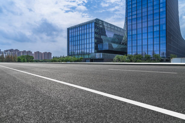 istock Empty urban road and modern skyline 916362126