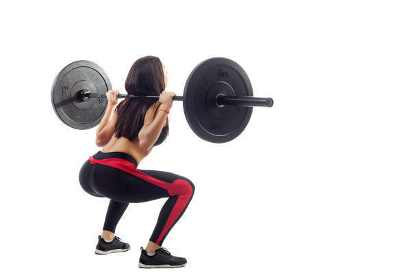 istock Woman doing squat with a barbell 916362202