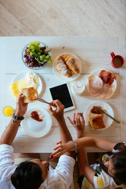 istock Above view of couple having breakfast together 916362524