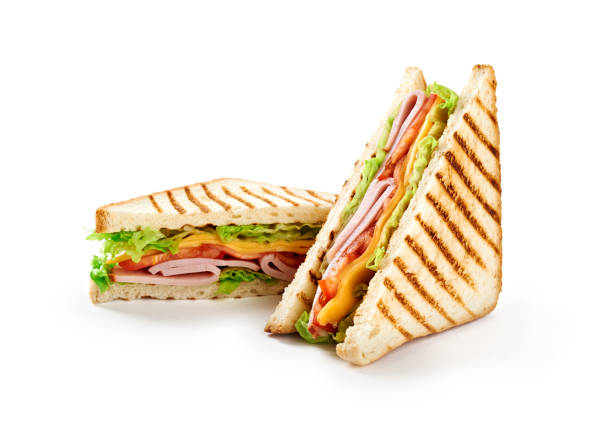 istock Sandwich with ham, cheese, tomatoes, lettuce, and toasted bread. Isolated on white background. 916365036