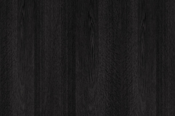 istock Wood texture with natural patterns, black wooden texture. 916366104