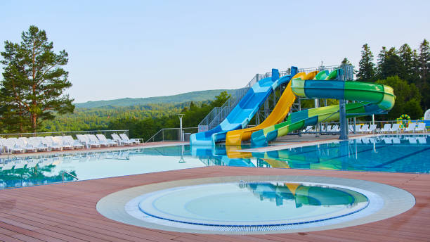 istock swimming pool in beautiful park 916376114