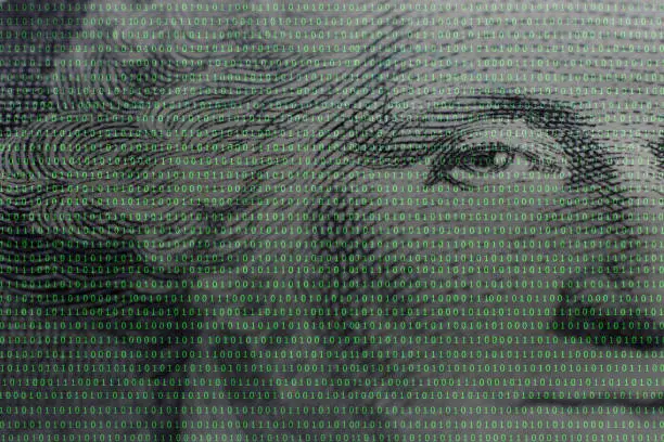 Photo of president George Washington face portrait on the USA one dollar banknote among binary code