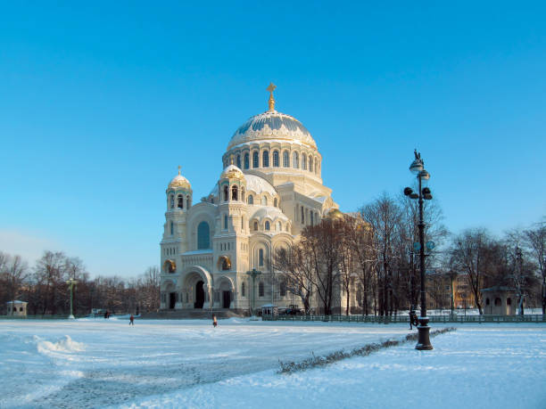 Winter skyline with Kronstadt Cathedral, facade with sunlight and blue sky.