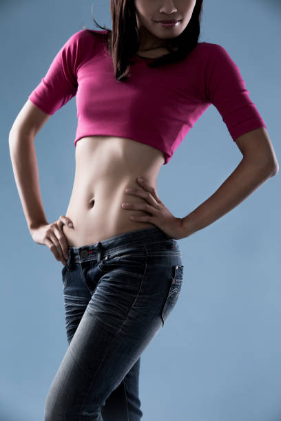 istock close up woman waist 916383400