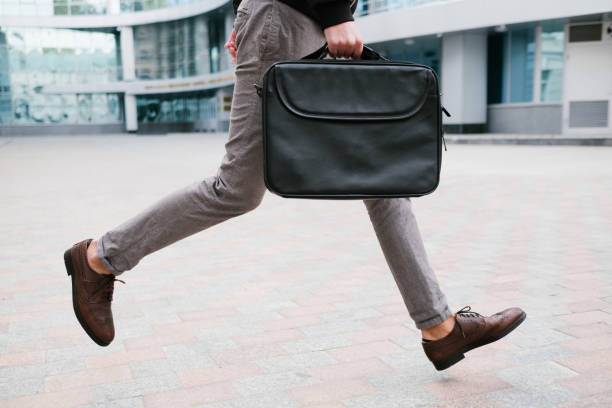 istock business man rush lifestyle running late work 916388566