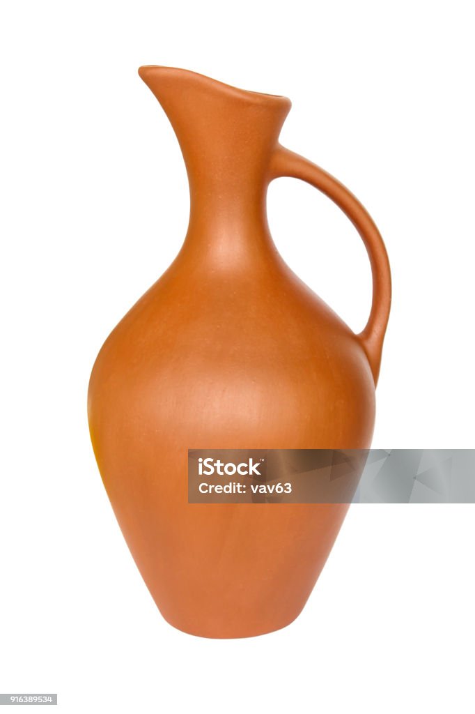 Pitcher of clay Clay jug with a narrow neck liquid isolated on white background Clay Stock Photo