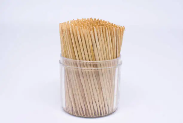 Photo of Wooden toothpicks isolated on white background