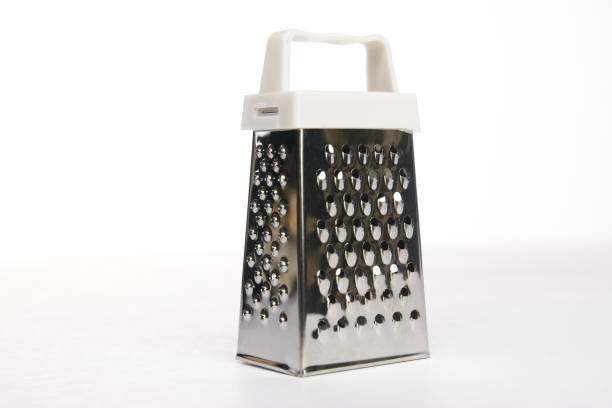 istock Single steel grater isolated on white 916393404