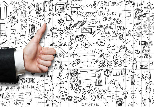 istock Thumbs up with felt tip pen charts on whiteboard  (Click for more) 916393732