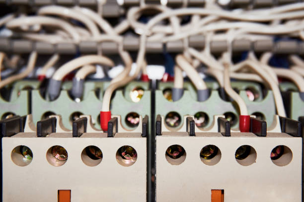 istock Electrical wires connected to the numbered relays. Close-up. 916393758