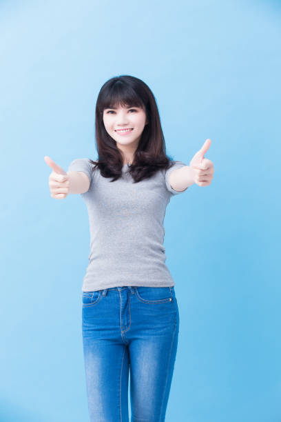 istock young woman student thumb up 916400502