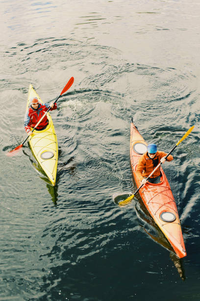 istock Two men are kayaking along the river. 916403448