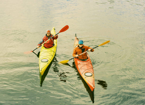istock Two men are kayaking along the river. 916403462